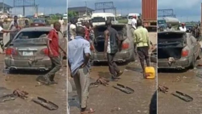 Nigerian Man Converts Petrol Engine To Gas, Car Catches Fire On Highway (Video) » Naijaloaded