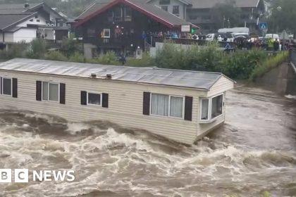 Storm Hans: Floodwaters in Norway send mobile home crashing into bridge