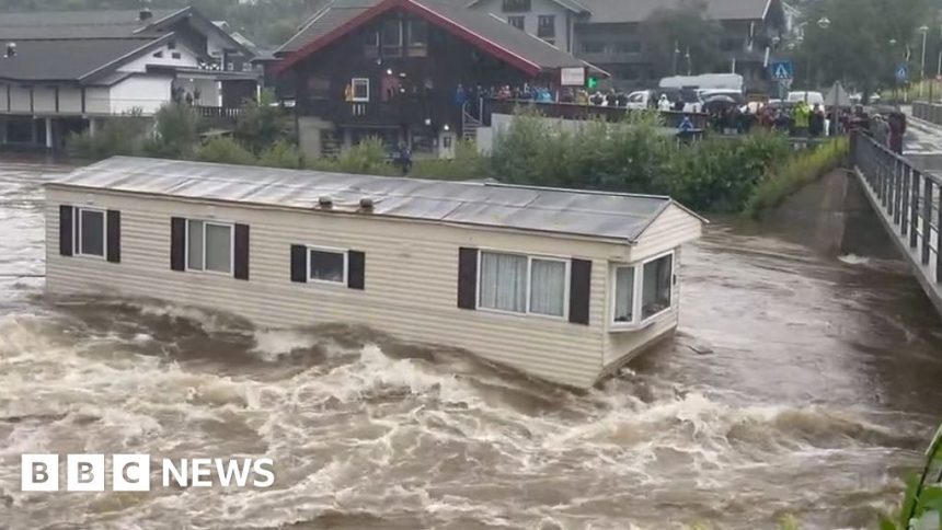 Storm Hans: Floodwaters in Norway send mobile home crashing into bridge