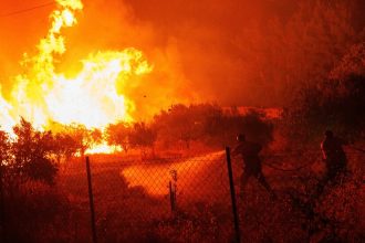 18 People Killed in Greek Wildfire May Be Migrants, Authorities Say