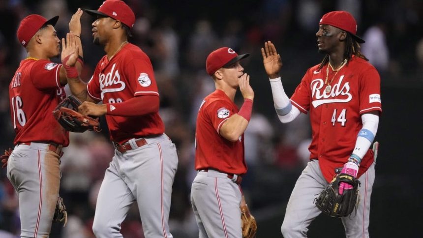 Reds halt D-backs’ winning streak on balk in 11th