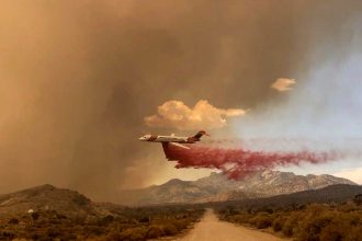 Photos: Firefighters contain a quarter of huge California-Nevada wildfire | Climate Crisis News