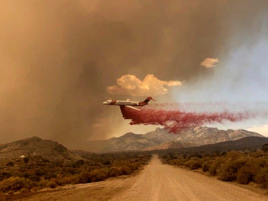 Photos: Firefighters contain a quarter of huge California-Nevada wildfire | Climate Crisis News