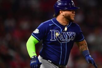 Rays hit into triple play before downing Angels in 10