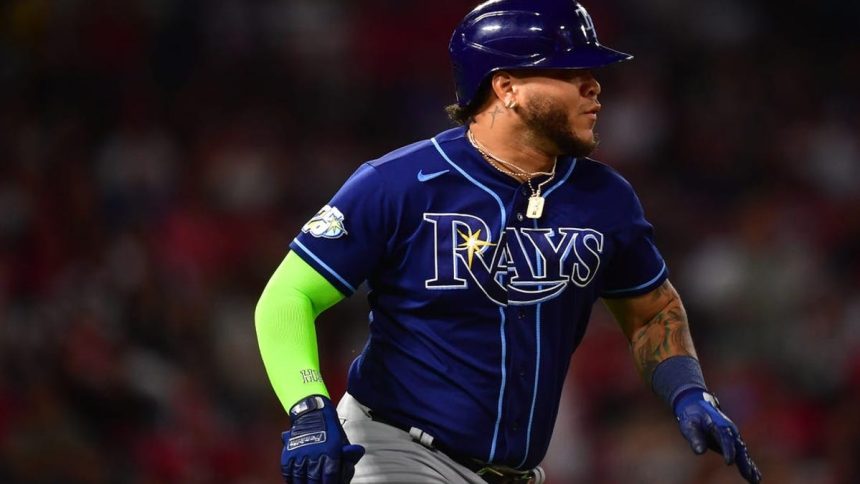 Rays hit into triple play before downing Angels in 10