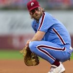 Phillies standout Bryce Harper (back) out of lineup vs. Twins