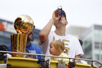 Drunk Nikola Jokic getting dragged away by his brother in middle of busy street 