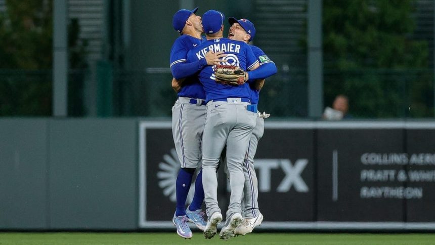 Blue Jays visit Rockies, look to gain more ground in wild-card chase