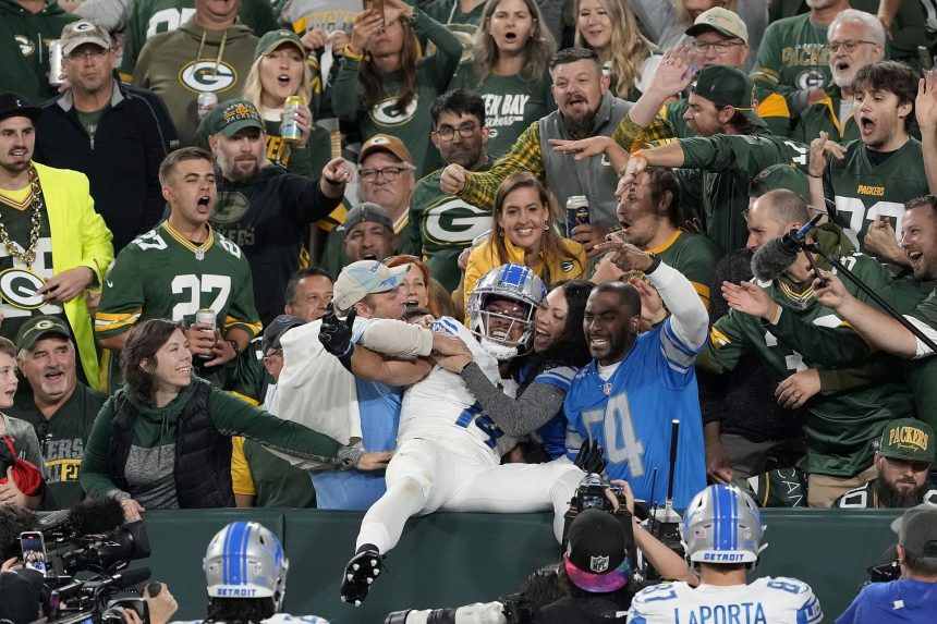 NFL fans lash out at a Packers fan for pouring beer over Amon-Ra St. Brown after Lions WR scores TD