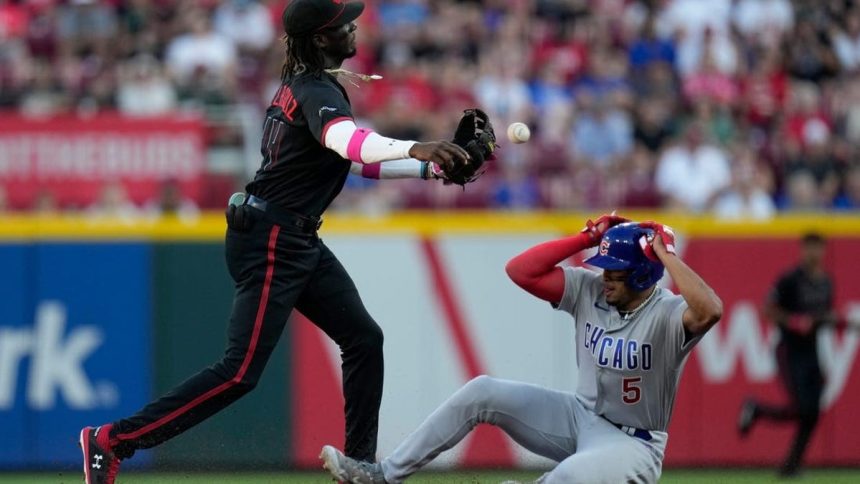 Playoff-hungry Reds, Cubs battle in series finale