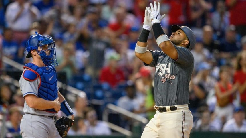 Dodgers endure long rain delay to earn win over Nats