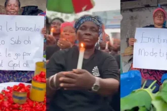 Ghana Traders Light Candles, Display Placards in Honour of Mohbad (Video)