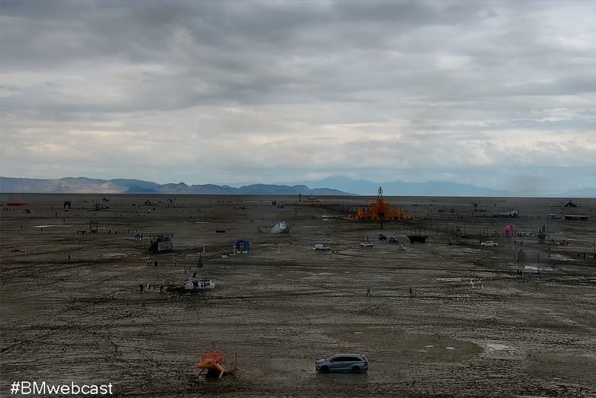 Burning Man attendees told to “shelter in place” as heavy rain & mud shut down access