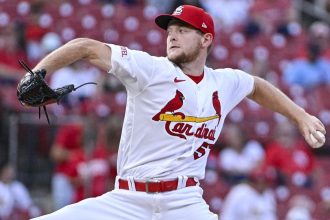 Cardinals hope to extend hot streak against Reds